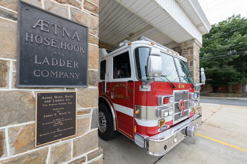 truck and firehouse sign