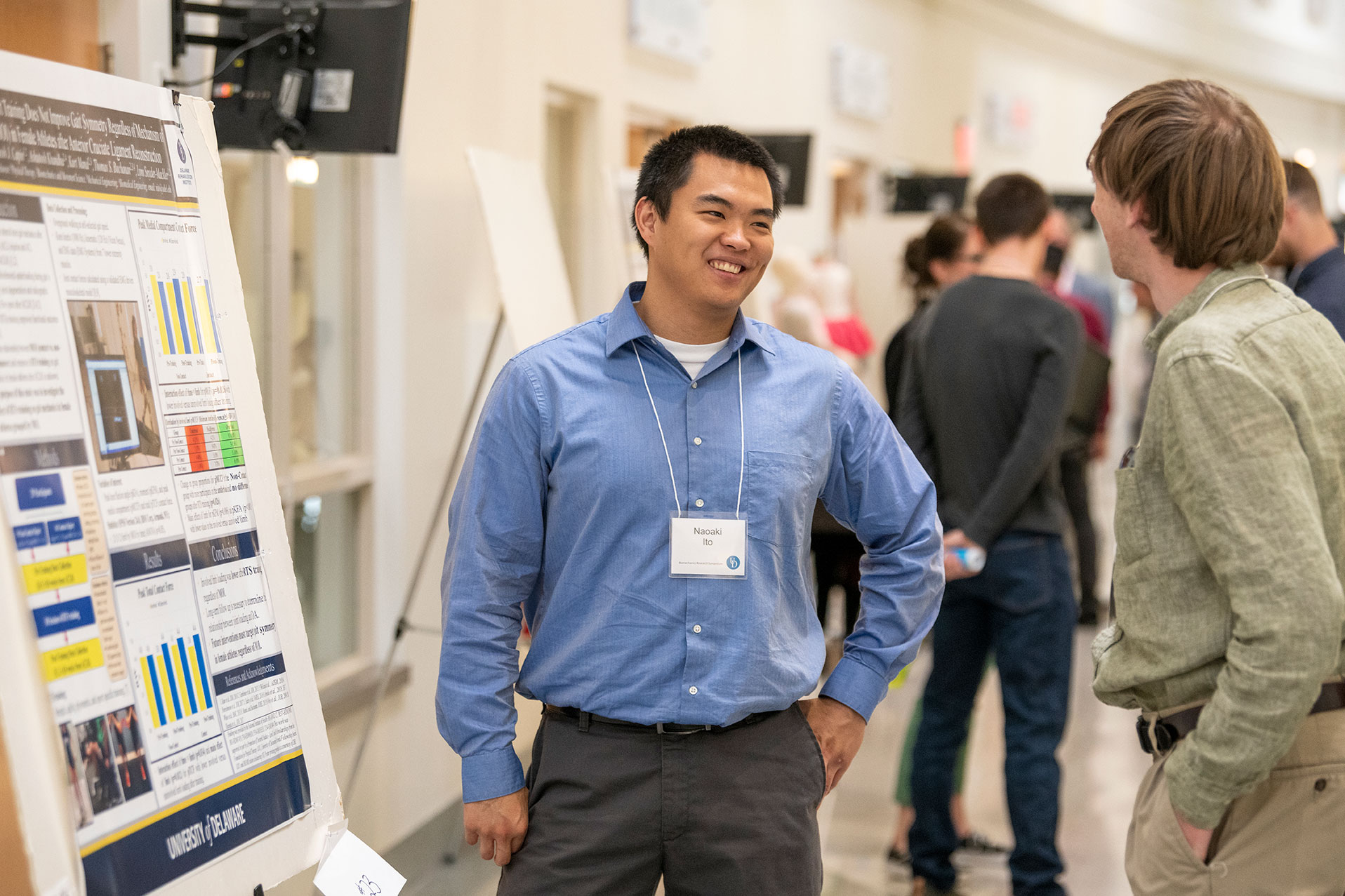 student with poster